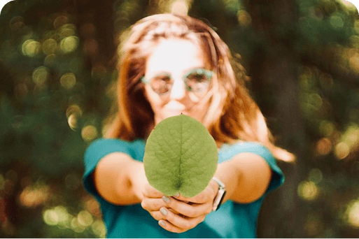 Person holding a leaf