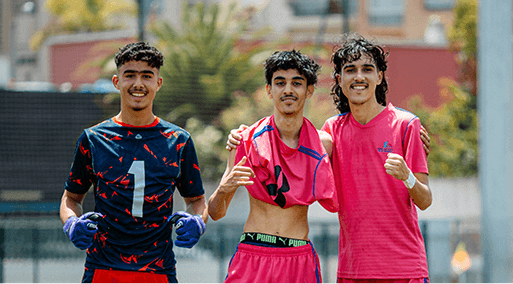 A sports team posing for a photo